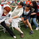Contestants race to find a chair as the music stops during the Musical Chairs World Championship in Amesbury